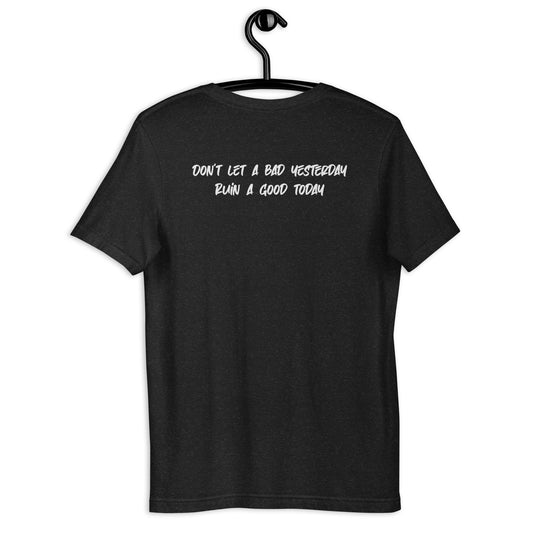 Unisex T-shirt from Tribe of Weirdos featuring the empowering mantra 'Don't Let A Bad Yesterday Ruin A Good Today' in bold white lettering on a backdrop of serene black fabric, symbolizing strength and positivity.