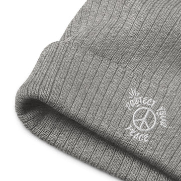 Snug and stylish 'Protect Your Peace Ribbed Knit Beanie' by Tribe of Weirdos, crafted for warmth and mindfulness.