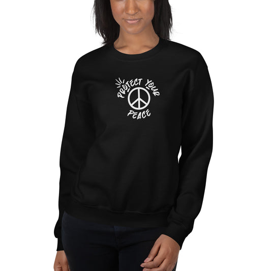 "Cozy 'Protect Your Peace' unisex sweatshirt in soft hues, embodying comfort and a serene lifestyle by Tribe of Weirdos."
