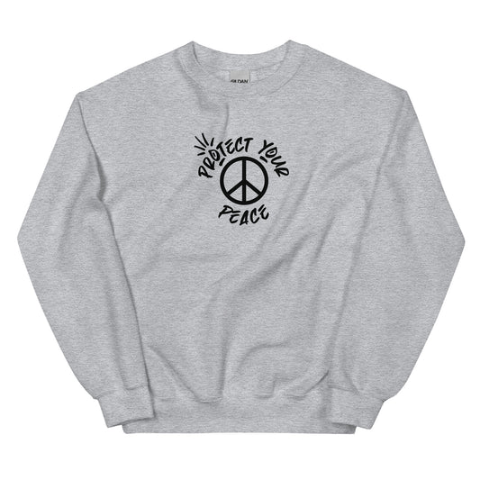 "Cozy 'Protect Your Peace' unisex sweatshirt in soft hues, embodying comfort and a serene lifestyle by Tribe of Weirdos."