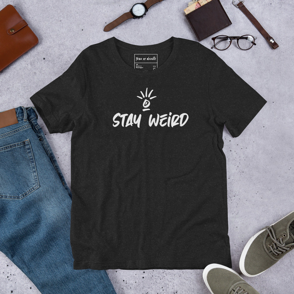 Casual 'Stay Weird' unisex t-shirt, worn to express individuality and the joy of embracing life's quirks.